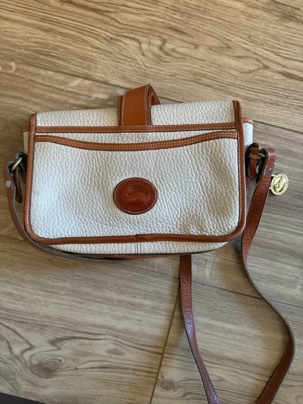 Dooney & Bourke Cream and Tan Pebbled Leather Crossbody